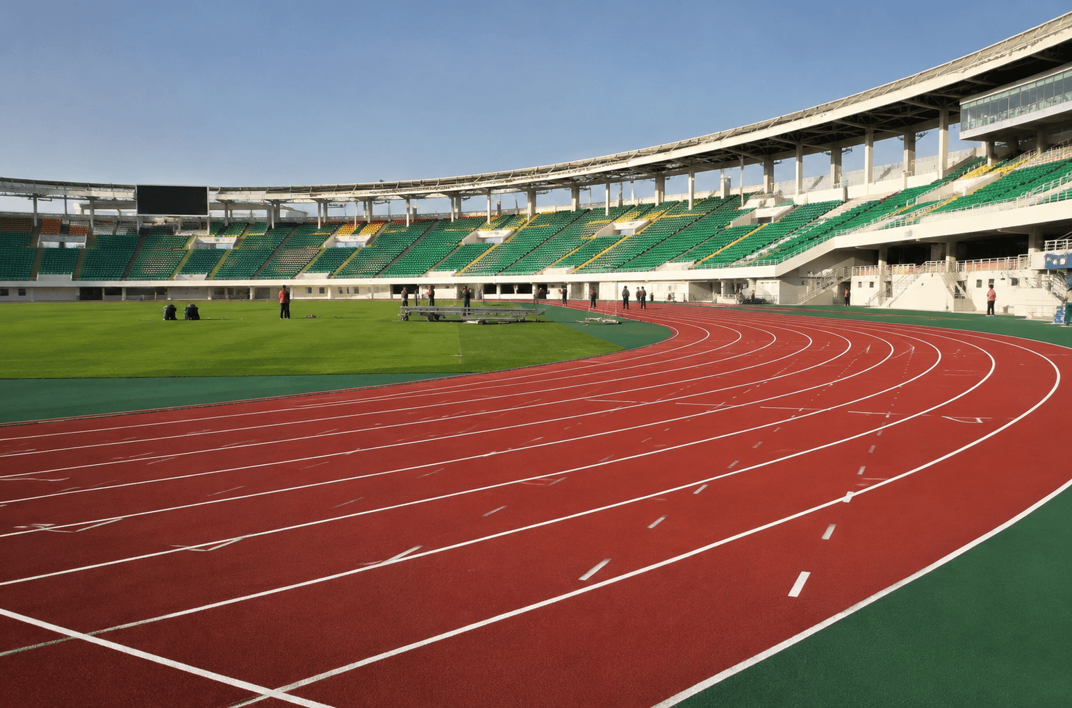 National athletics stadium with red IAAF running track
